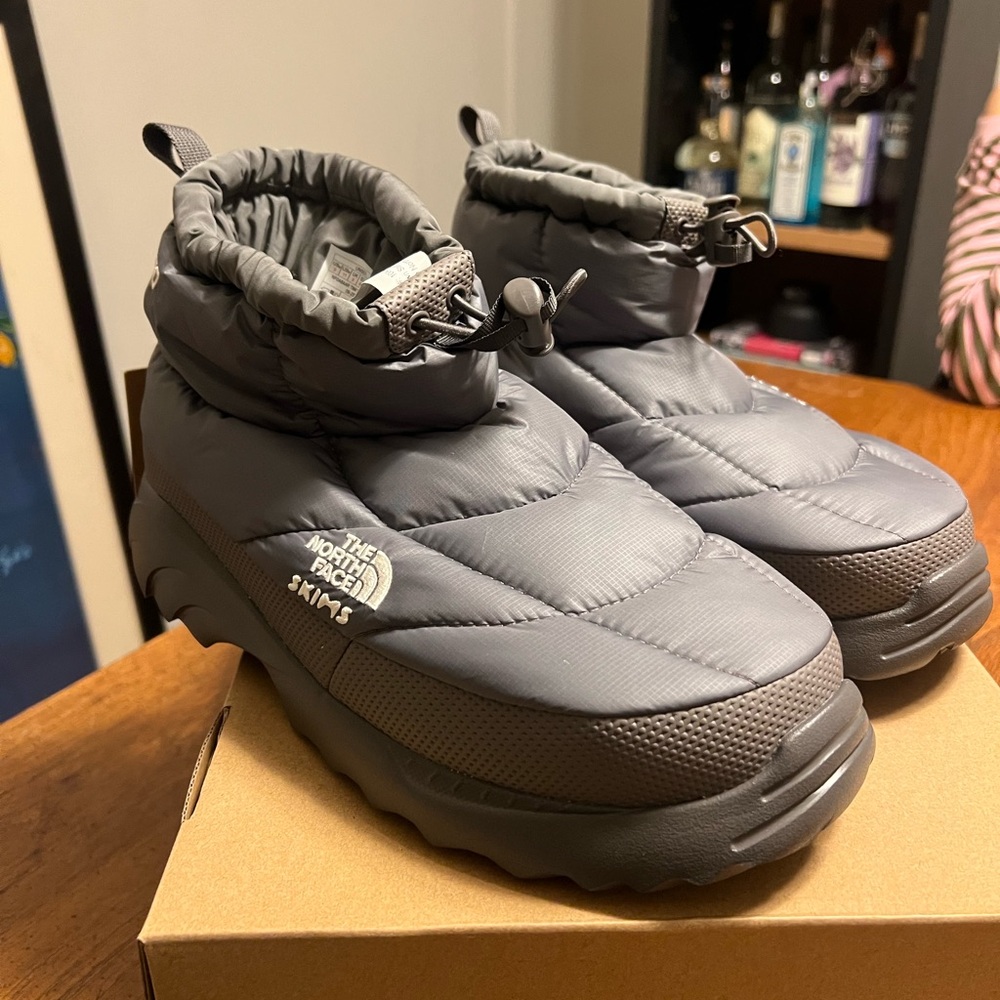 Skims x North Face collab grey boots